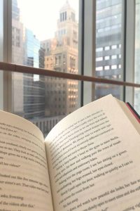 reading by the window